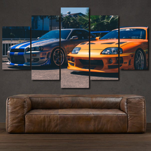 Load image into Gallery viewer, Fast &amp; Furious Nissan GT-R R34 &amp; Toyota Supra 5-piece framed canvas print – wall art gift for sports car enthusiasts